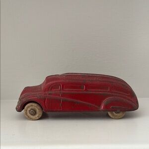 Red Vintage 1930’s Sun Rubber Company Streamlined Sedan